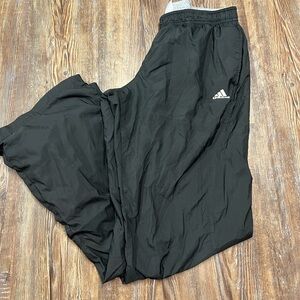 Black vintage Y2K Adidas track pants with white logo
